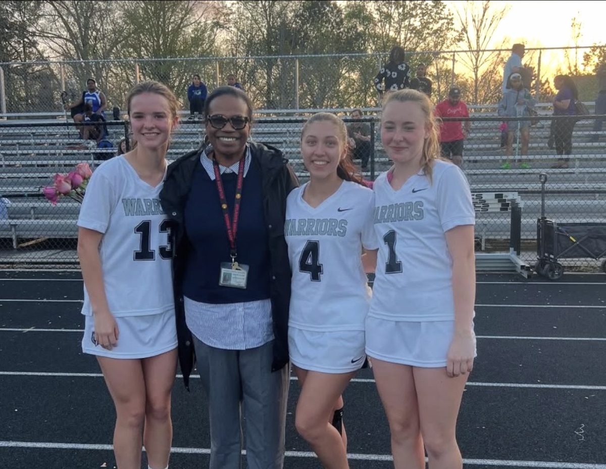Lacrosse Seniors celebrate their favorite teachers at a recent game. 